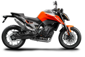 Das Bild zeigt ein KTM-Motorrad in auffälligem Orange und Schwarz, ideal für sportliche Fahrten und Abenteuer.