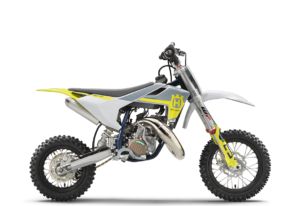 Husqvarna TC 50 Motocross-Motorrad in modernem Design mit gelben Akzenten und robustem Reifenprofil.